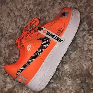 Orange Nike “just do it” women’s size 7